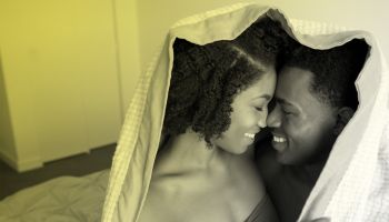 black couple embrace