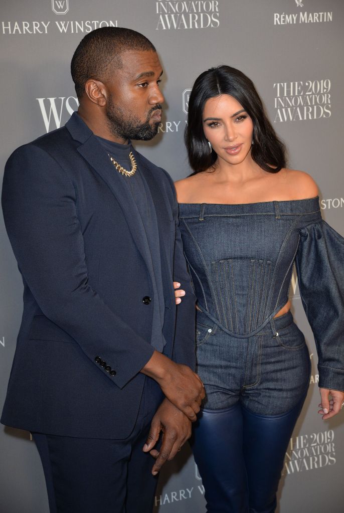 Kanye West, Kim Kardashian West at arriv...