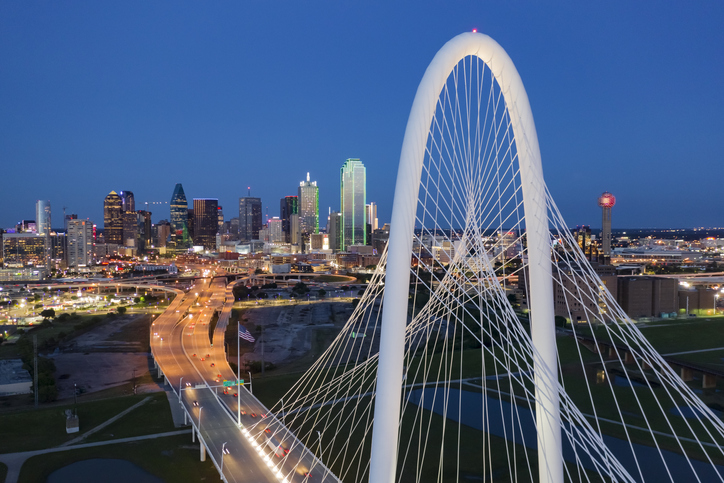 Elevated View of the Margaret Hunt Bridge and the Dallas Skyline at Dusk