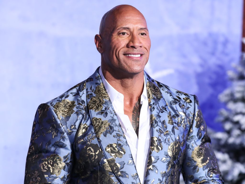 Actor Dwayne Johnson (The Rock) wearing Dolce & Gabbana arrives at the World Premiere Of Columbia Pictures' 'Jumanji: The Next Level' held at the TCL Chinese Theatre IMAX on December 9, 2019 in Hollywood, Los Angeles, California, United States.