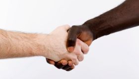 Black and white shaking hands