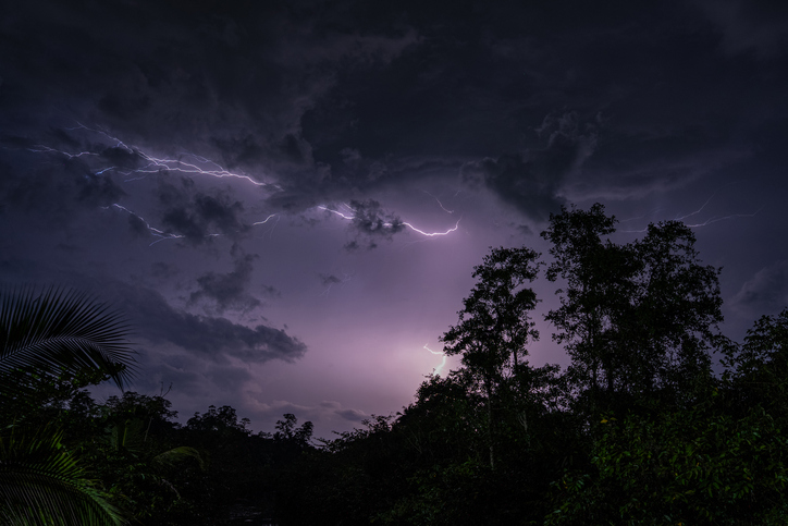 Dramatic lightning storm in dark night sky